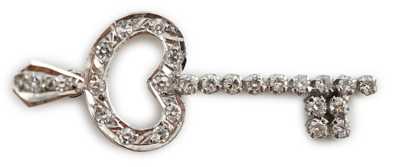 A mid 20th century Egyptian white gold and diamond cluster set 'key of the door' pendant